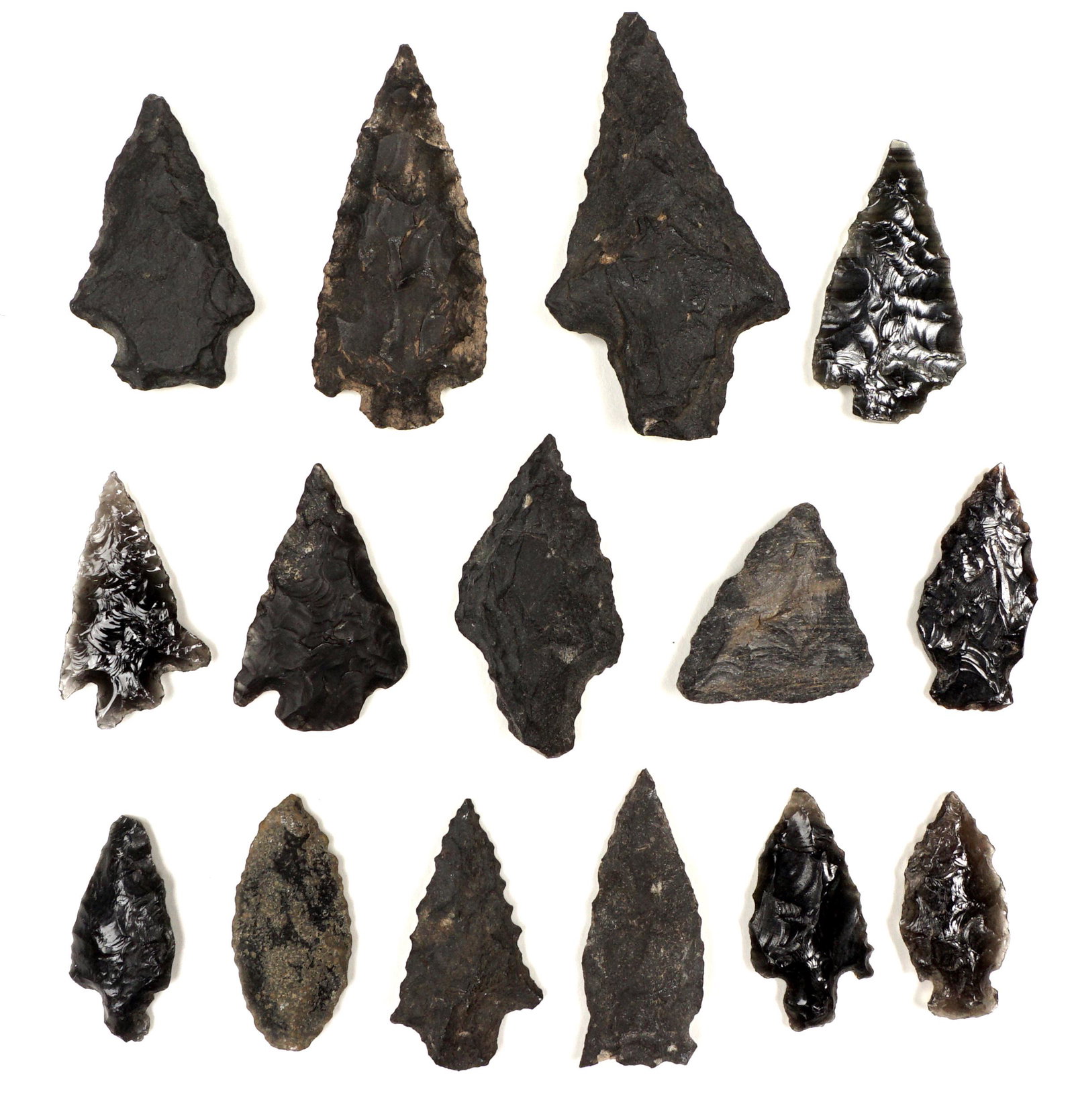 Collection of Nevada Gem Points: An assembled collection of 16 points, varying size and construction, largest 1.75". Sold in Riker case, 8.75" x 6.75".