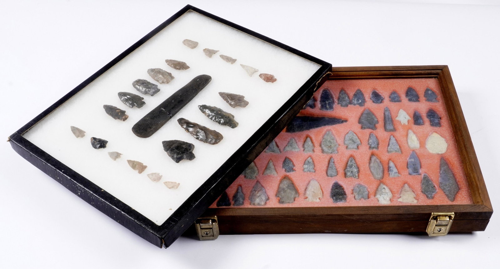 Collection of Woodland and Archaic Points: An assembled collection of approx. 79 Woodland and Archaic points, varying size and construction, largest measures 3.75". Center of Riker mount with repaired slate ornament, 6.5". Sold with Riker moun
