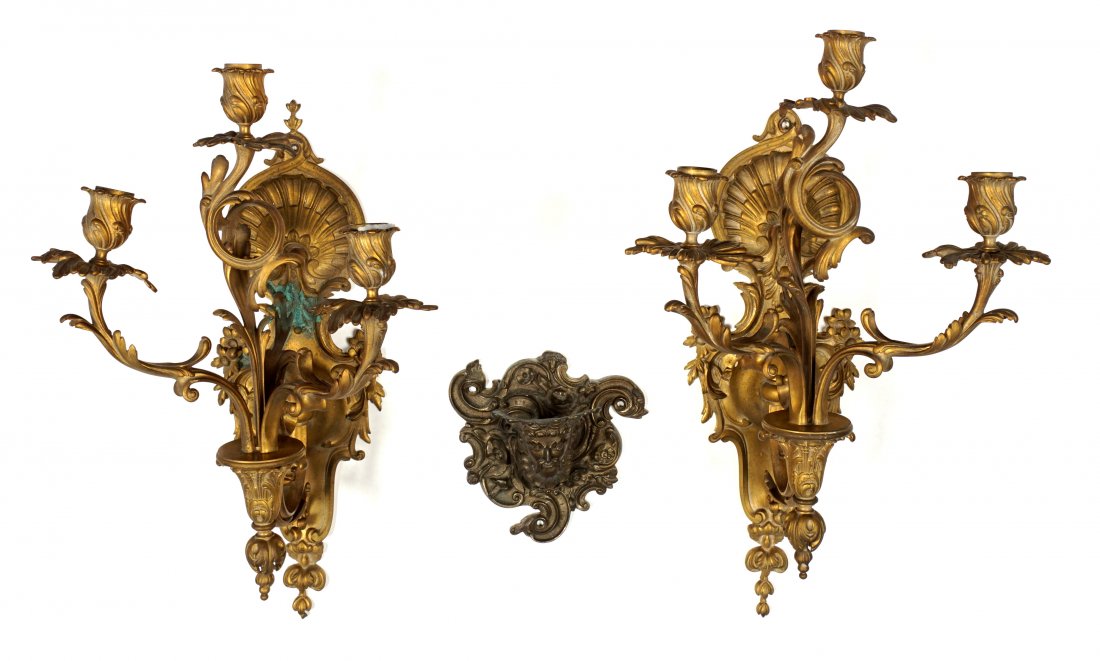 Three Louis XIV Bronze Sconces: Three pieces total to include a pair of gilt bronze three light sconces, foliate scroll and shell motif, 20.5" h. x 12" x 10.25". One with verdigris lower half. Sold with a later wall sconce base with