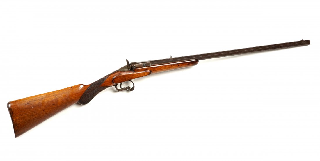 Belgium Flobert 22 Rifle: Unmarked Flobert single shot rifle, 24" octagon barrel, 22 caliber, wood stock, overall 39.25". Condition: In need of restoration, replacement screws, surface rust, chips and scrapes to stock, sold wi