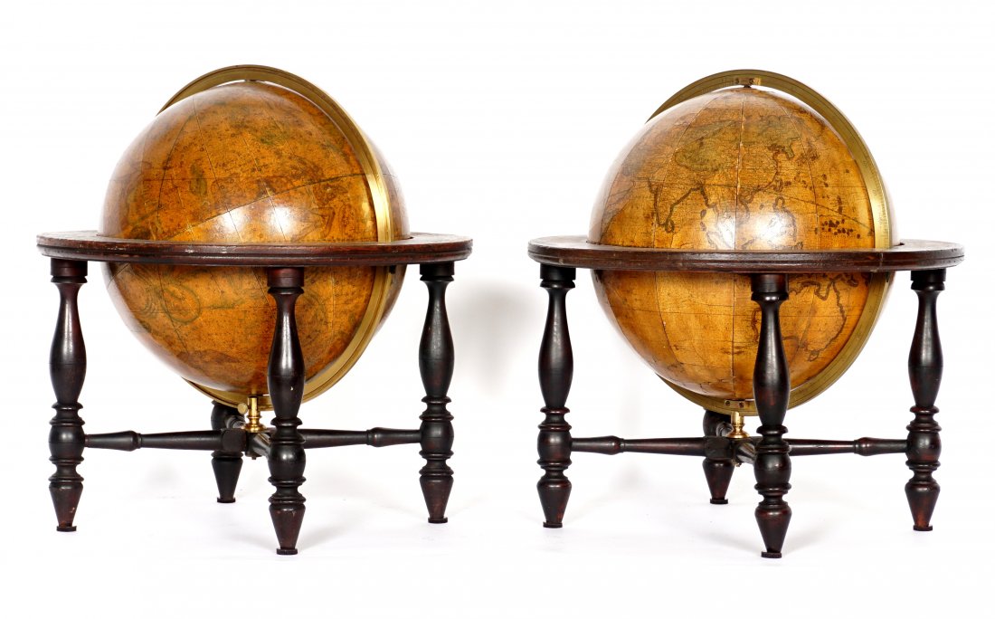 Pair Josiah Loring Boston 12 Inch Table Globes: Terrestrial and Celestial table globes produced by Joseph Loring, Boston, and dated 1841. 12" globes with engraved circumference brass rings. Sold with the original wood stands with paper chapter ring