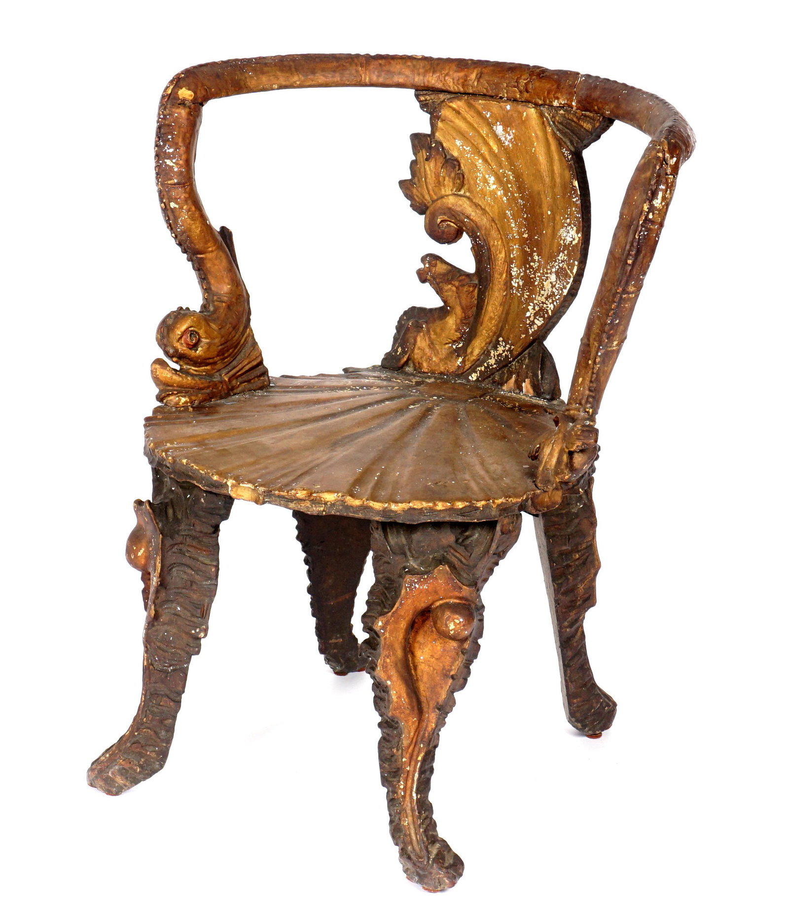 Antique Carved Venetian Barrel Back Armchair: Carved and shaped top rail continuing to figural dolphin arms, seahorse and shell back, shell seat, carved conch shell legs, silver and gold gilt decorated, overall 30.5" h. x 25" x 24". Condition: Re