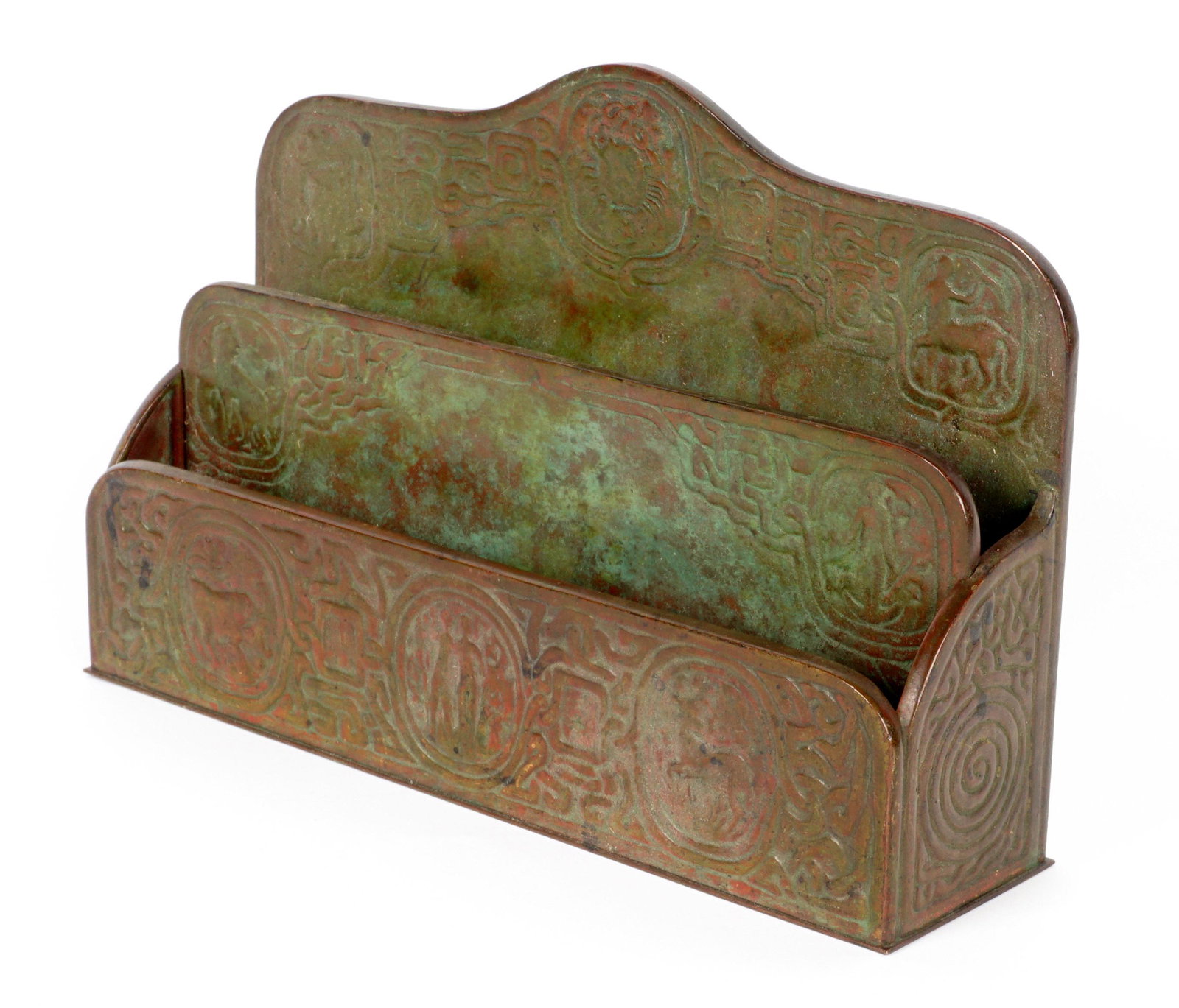Tiffany Studios Zodiac Bronze Letter Rack 1009: Letter rack in the Zodiac pattern by Tiffany Studios, overall 6.25" h. x 9.5" x 2.5". Condition: Verdigris.