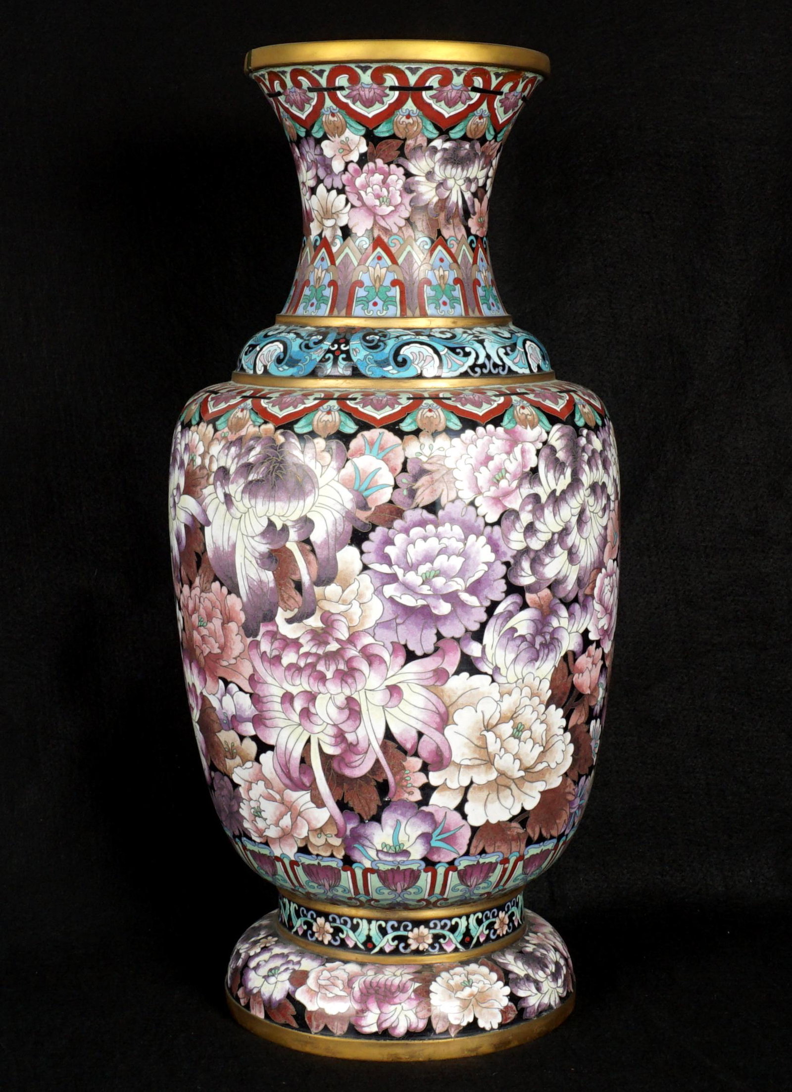 Large Chinese Cloisonne Vase: 20th Century, baluster form, peonies and chrysanthemum decorated, overall 25.25" h. x 11.5". Sold with pierced carved wood base, 4" x 11.5". Condition: Rim chip.