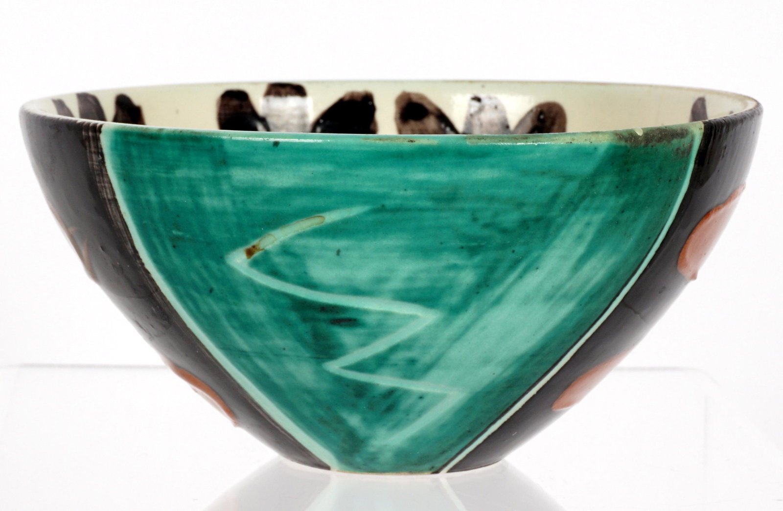 Picasso Madoura Visage Face Ceramic Bowl: PICASSO, Pablo, (Spanish, 1881-1973): Circa 1955, white ceramic bow with polychrome glaze decoration, incised marking on base "Edition Picasso Madoura". 2.5" h. x 5" dia. Condition: Approx. 2.25" crac