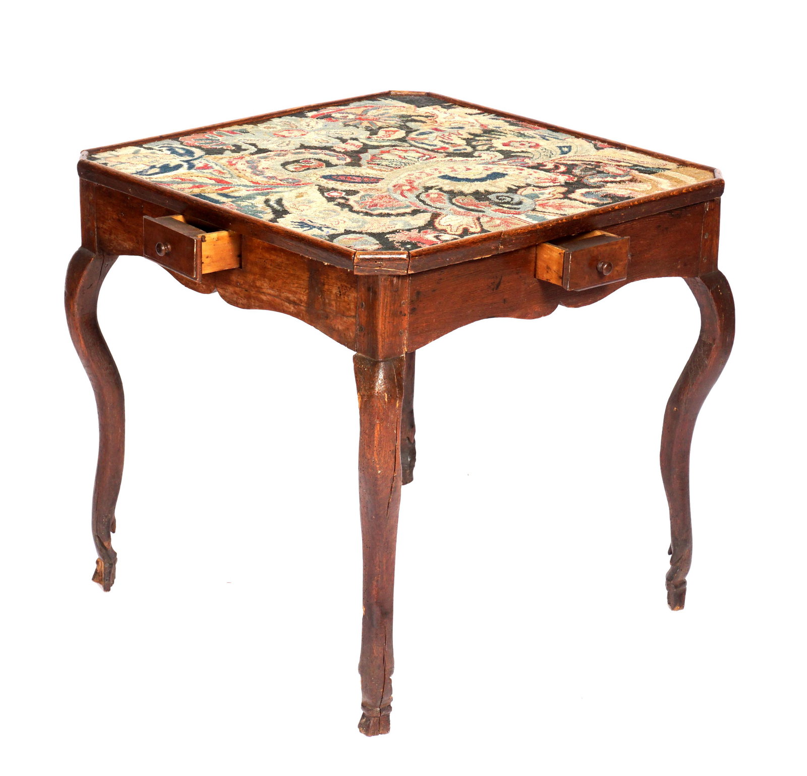 French 18th Century Needlepoint Game Table: Floral needlepoint top with canted corners. shapes skirt, small drawer on all four sides, serpentine legs ending in hoof feet. Overall 27" h. x 27" x 27.5". Condition: Wear to top, chips and loss to f