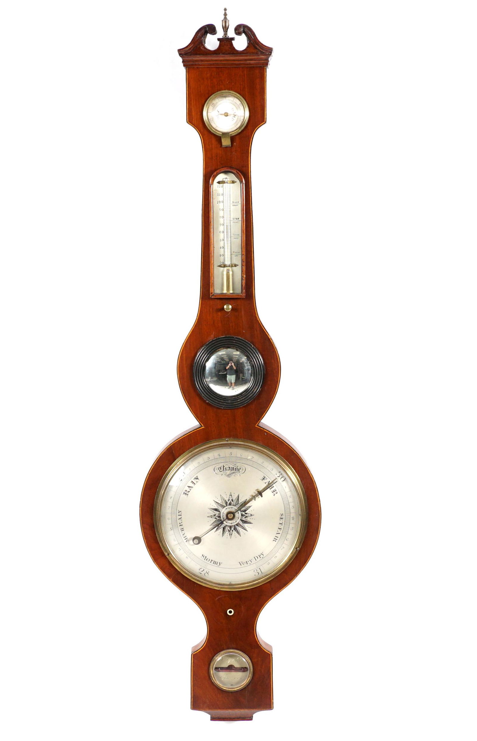 Gerletti Mahogany Case Scottish Wheel Barometer: Regency period mahogany veneer case with string inlay, , broken arch pediment. Silvered hygrometer, thermometer, dial and level, center convex mirror. Marked C. Gerletti, Glasgow on level. Overall 39.