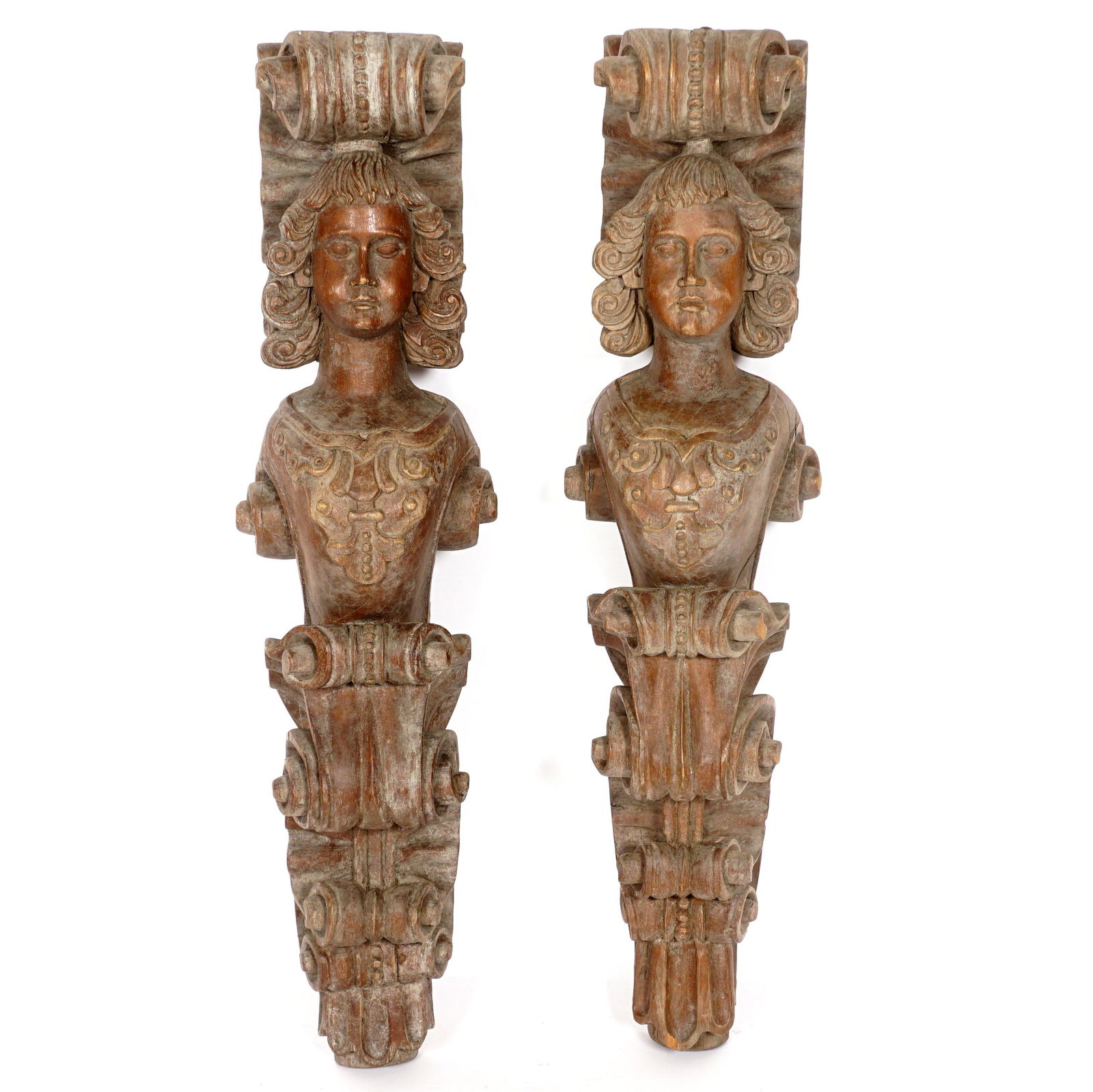Pair Carved French Figural Corbels: Carved scroll top over figural maiden busts, lower scrolls, overall 46" h. x 11" x 10". Condition: Wear.