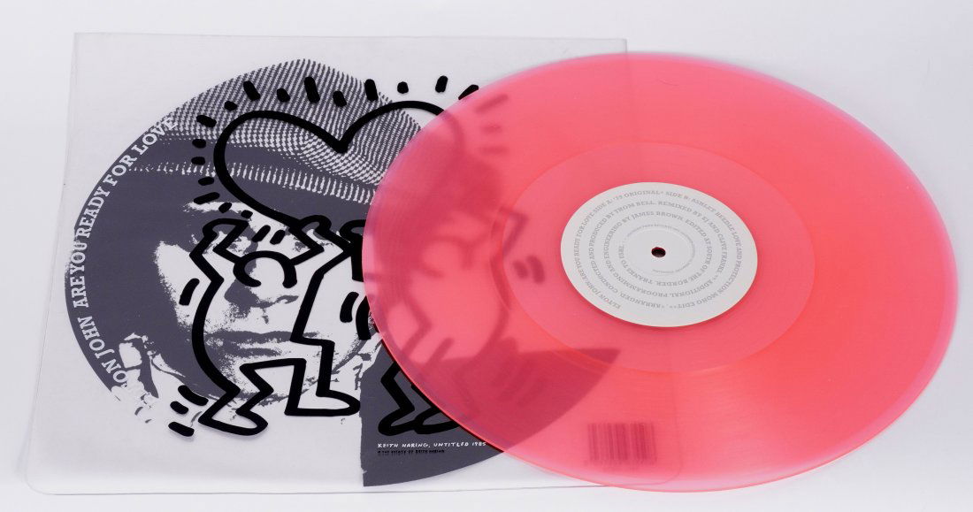 after Keith Haring Elton John Pink Vinyl Record: after HARING, Keith, (American, 1958-1990): 2003 release of "Are You Ready for Love" by Elton John, transparent cover and center label with untitled image by Haring, authorized by the Haring estate, 1