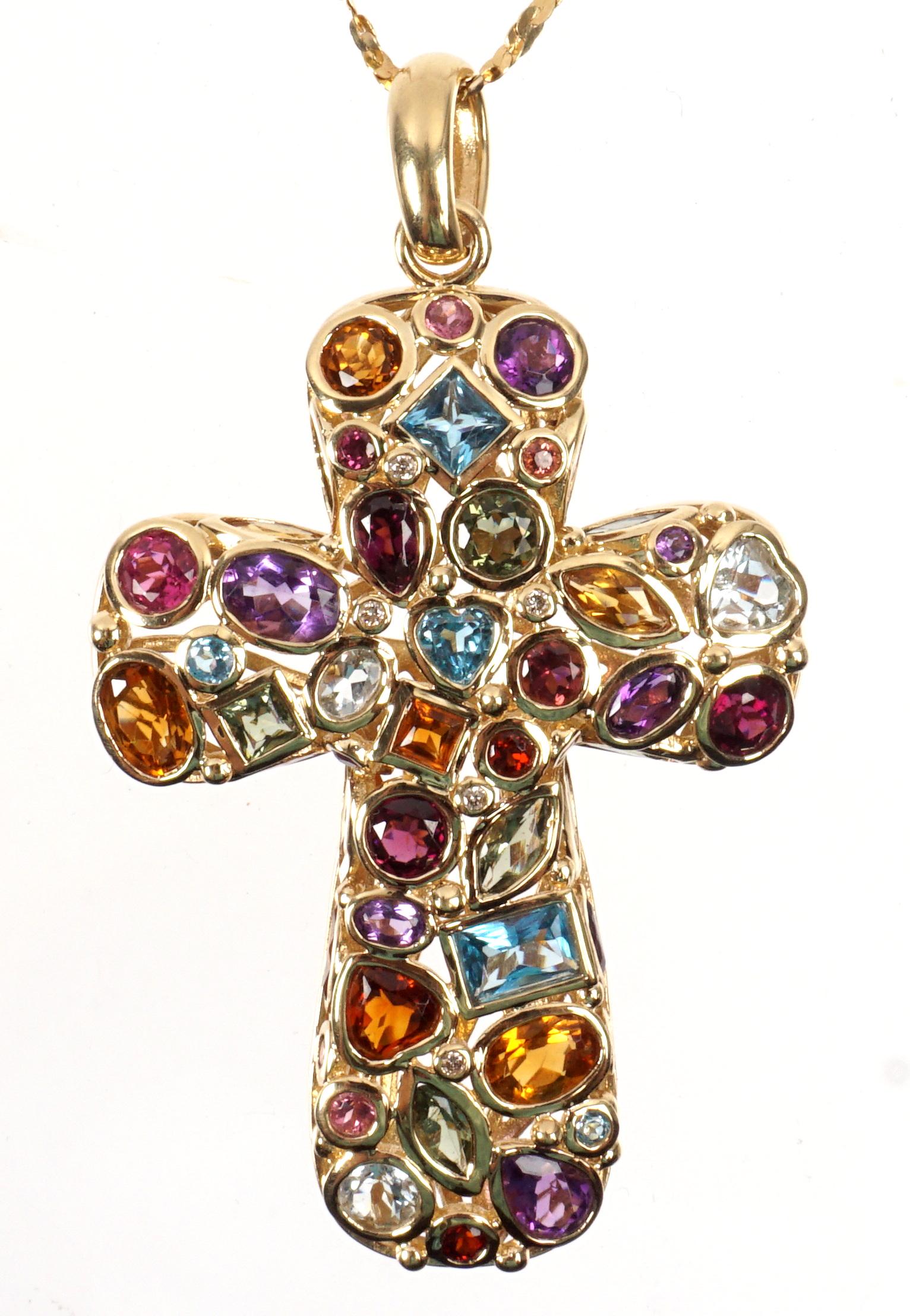 Italian 14k Gold Multi Stone Cross Necklace: Inset multi stone hollow cross pedant, marked 14K, 3 illegible initials on bail, 2" x 1.5". Milor gold chain, 21.5". Approx. 21 grams inclusive.