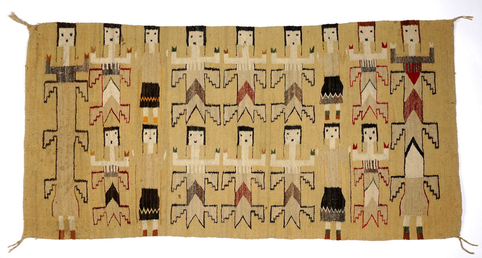 Vintage Navajo Yei Rug: Early to mid 20th Century, Yellow ground, 16 figures, overall 2' 10" x 5' 6". Condition: Stains, tear, in need of conservation.