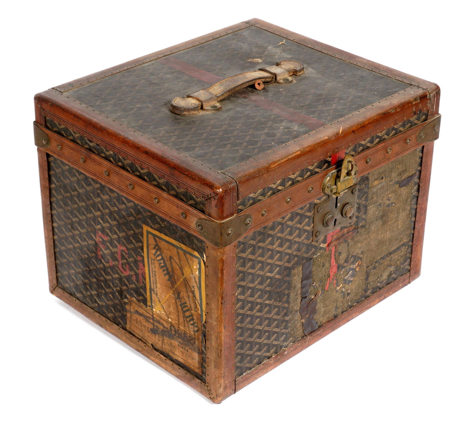 Vintage French Goyard Hat Trunk: Early 20th Century, chevron patter exterior, tacked leather borders, brass hardware and corners. Stamped Goyard Aine on clasp, overall 13.25" x 17.25" x 15". Condition: Older paper labels and wear to