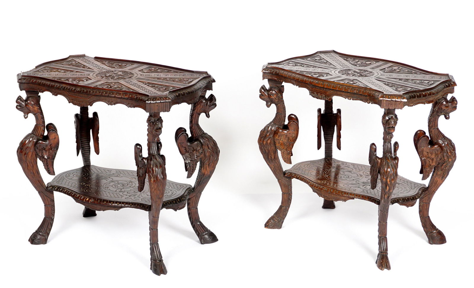 Pair Italian Rococo Revival Carved Tea Tables: Circa 1910, removed glass tea trays with carved frames over profusely carved serpentine top, figural dragon legs, open lower stretcher shelf, hoof feet. Overall 29.5" h. x 31.75" x 20.75". Condition: