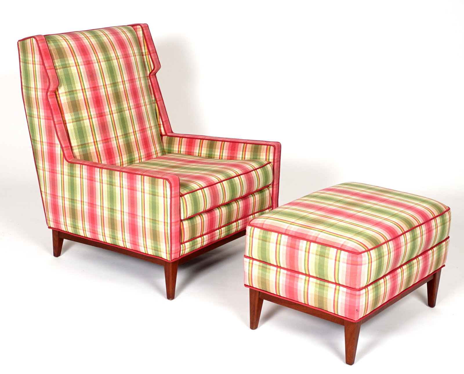 Wormley for Dunbar Club Chair and Ottoman: Plaid upholstered club chair and matching ottoman, Edward Wormley for Dunbar, teak wood supports and legs. Chair 37.75" h. x 29.25" x 33.5", ottoman 17.75" x 27" x 19". Condition: Wear consistent with