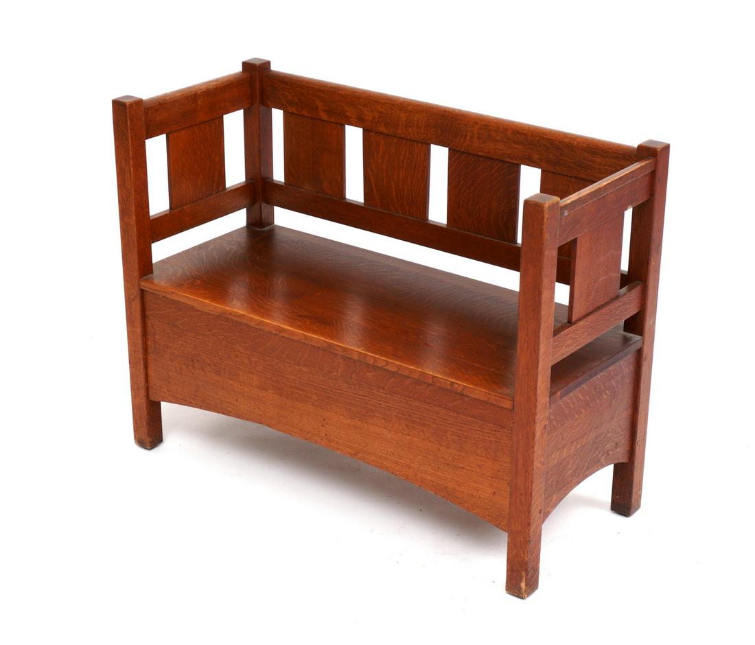 L & JG Stickley Hall Bench with Slide Out Drawer: Arts & Crafts oak hall bench, even arms, four larger bask splats, single slat under each arm, lower slide out drawer with original L. & J. G. Stickley label. Fitted seat cushion. Overall 32.25" h. x 4