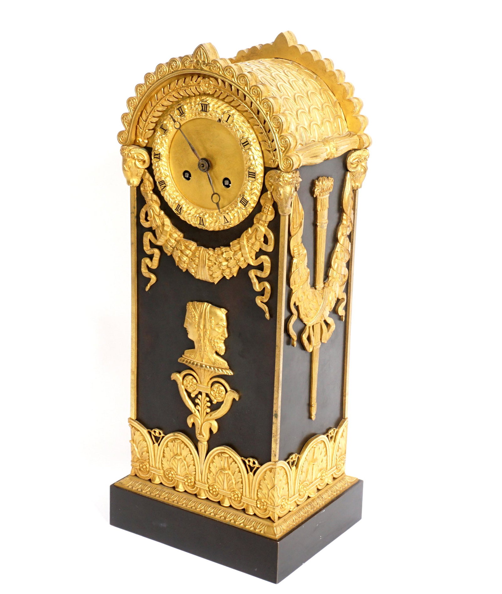 Simon French Parcel Gilt Bronze Mantle Clock: Arched patinated bronze case with applied gilt bronze accents and decoration, gilt bronze dial, time and bell strike movement marked with partially obscured stamped "Simon A Paris", overall 15.25" h.