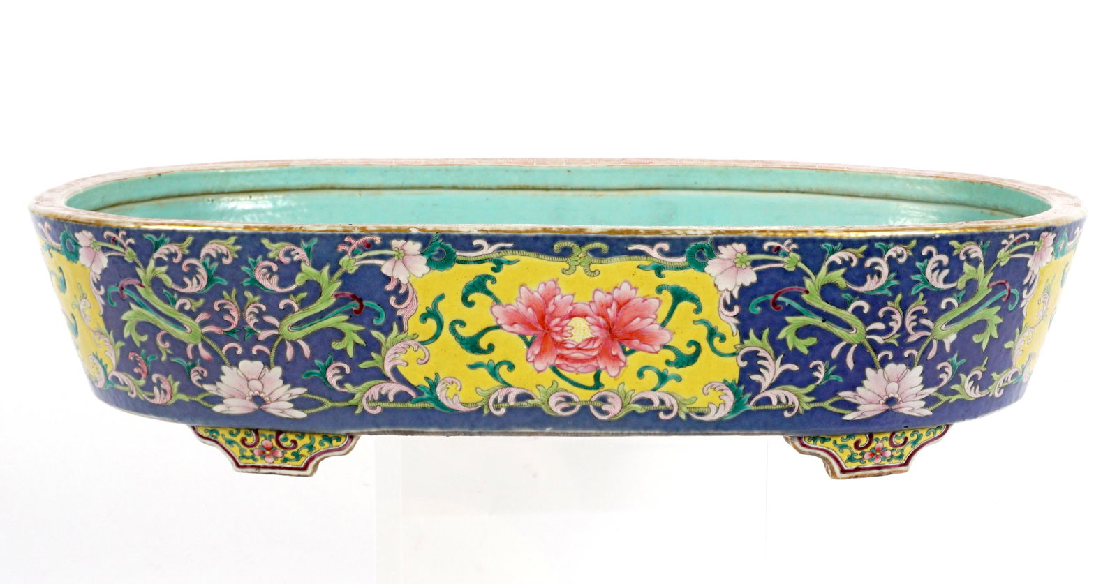Antique Chinese Enameled Porcelain Bonsai Basin: Circa 19th Century elongated oval form bonsai or penjing basin, turquoise interior, floral enamel decoration exterior, on four feet. Overall 4" h. x 16.75" x 9". Condition: Minor loss of decoration, n