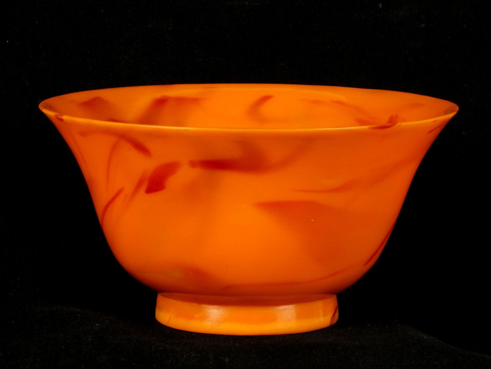 Qing Mottled Orange Chinese Peking Glass Bowl: Diminutive mottled orange / red bowl, flared rim, on ring foot, inscribed four character mark on base. Overall 1.75" x 3.5". While we believe this to be 18th/19th Century, actual age unknown.