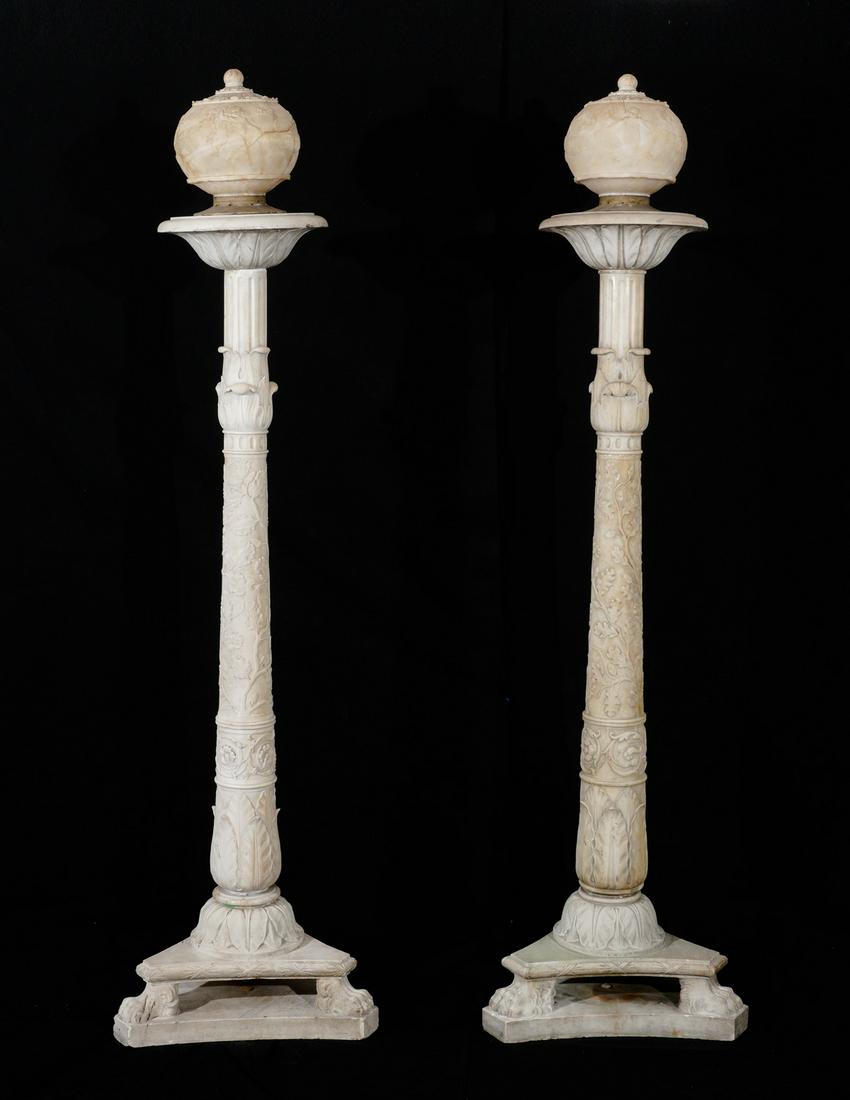 Pr. Italian Carved Marble and Alabaster Torchieres: Alabaster carved shades, acanthus leaf and neoclassical putti motifs. Carved marble column shaft with bands of acanthus leaf, fluted, oak leaves and acorns, floral scroll, lower acanthus leaves over t