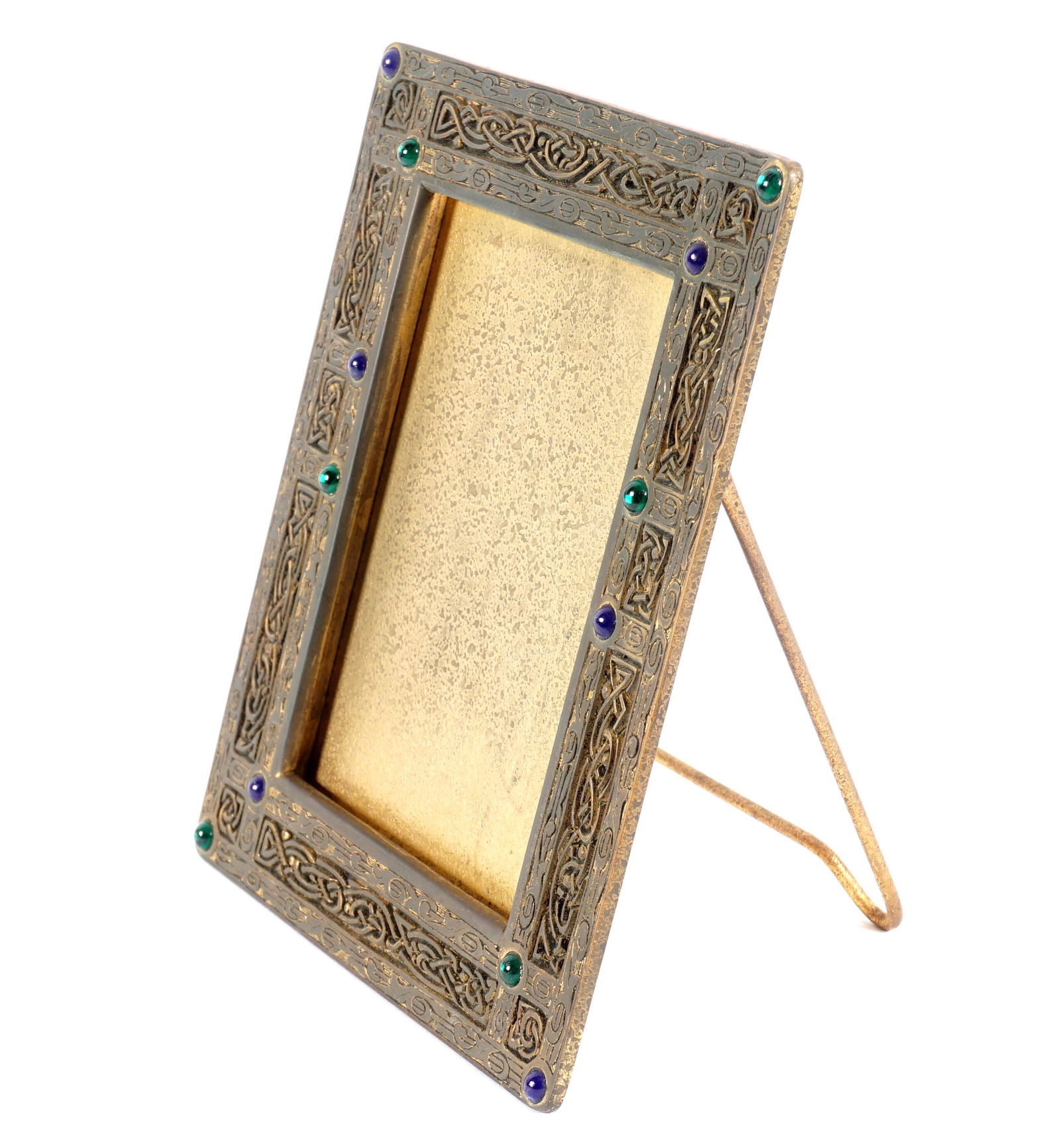 Tiffany Studios Bronze Ninth Century Picture Frame: Bronze easel back frame in the Ninth 9th Century pattern with inset blue and green glass beads, well marked on back Tiffany Studios, New York, 1697. Overall 8" h. x 6.5". Condition: Substantial wear t