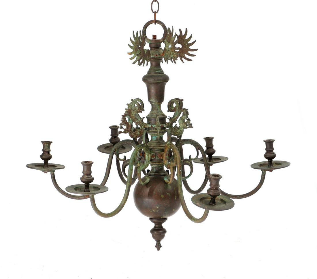 17th Century Style German Bronze Chandelier: Six arm chandelier adorned with figural mythological serpent men figures and stylized wings, overall 26.5" h. x 60". Condition: Verdigris.