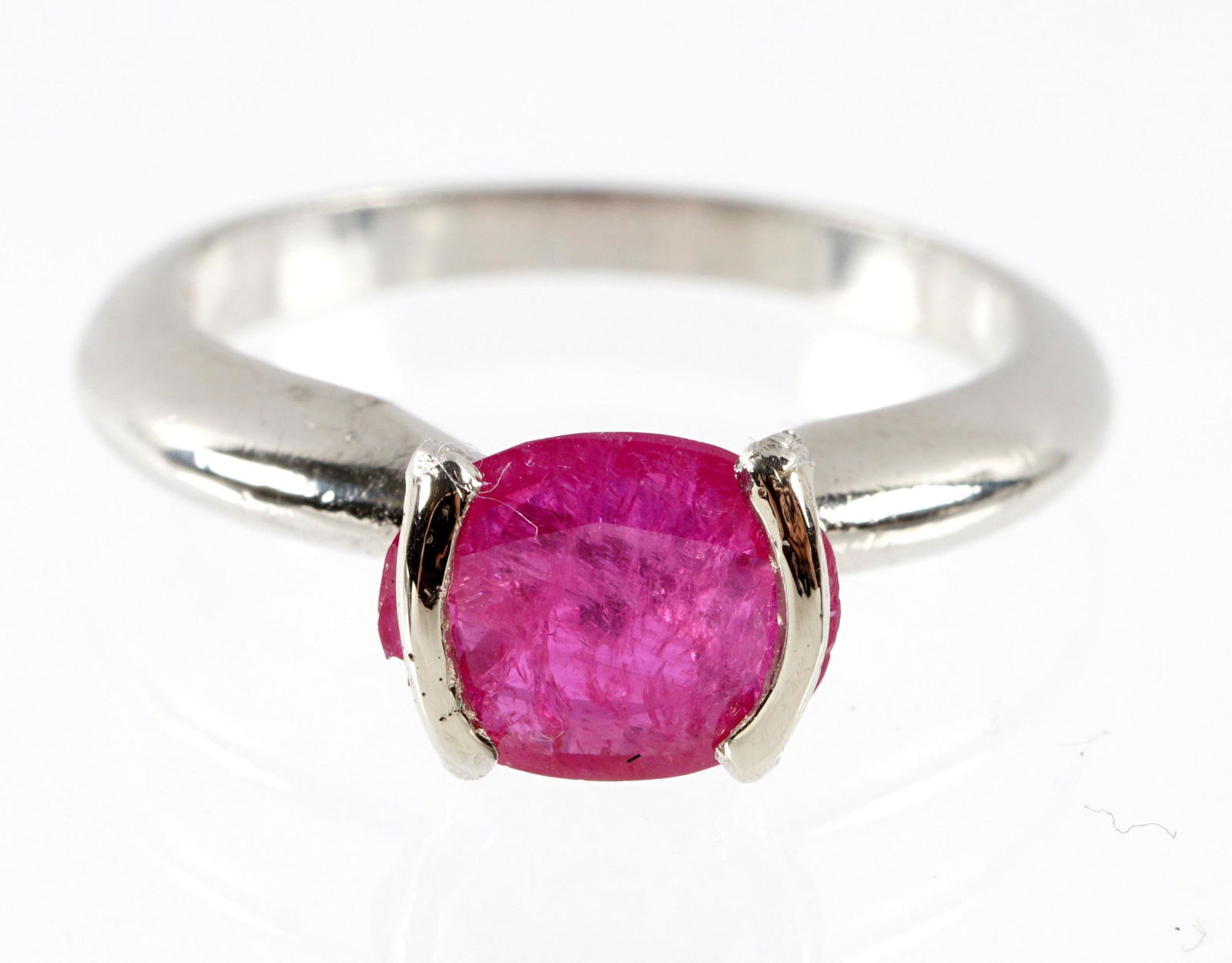 Ladies Platinum and Ruby Ring: Platinum 950 band, single center ruby approx. 6mm x 6mm. Approx. 4 grams, size 5.