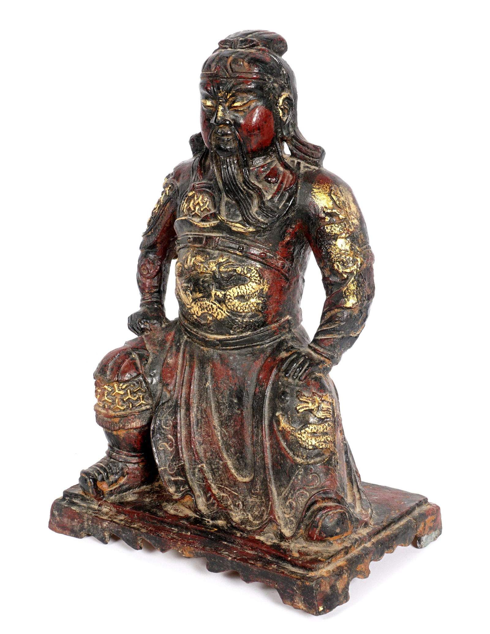 Japanese Cast Iron Samurai Warrior Figure: Figure of a seated samurai warrior, remains of red and gilt paint decoration, no visible markings, 13.5" h. x 9.25" x 6.5". Condition: Rust, wear, and weathering from outdoor exhibition.