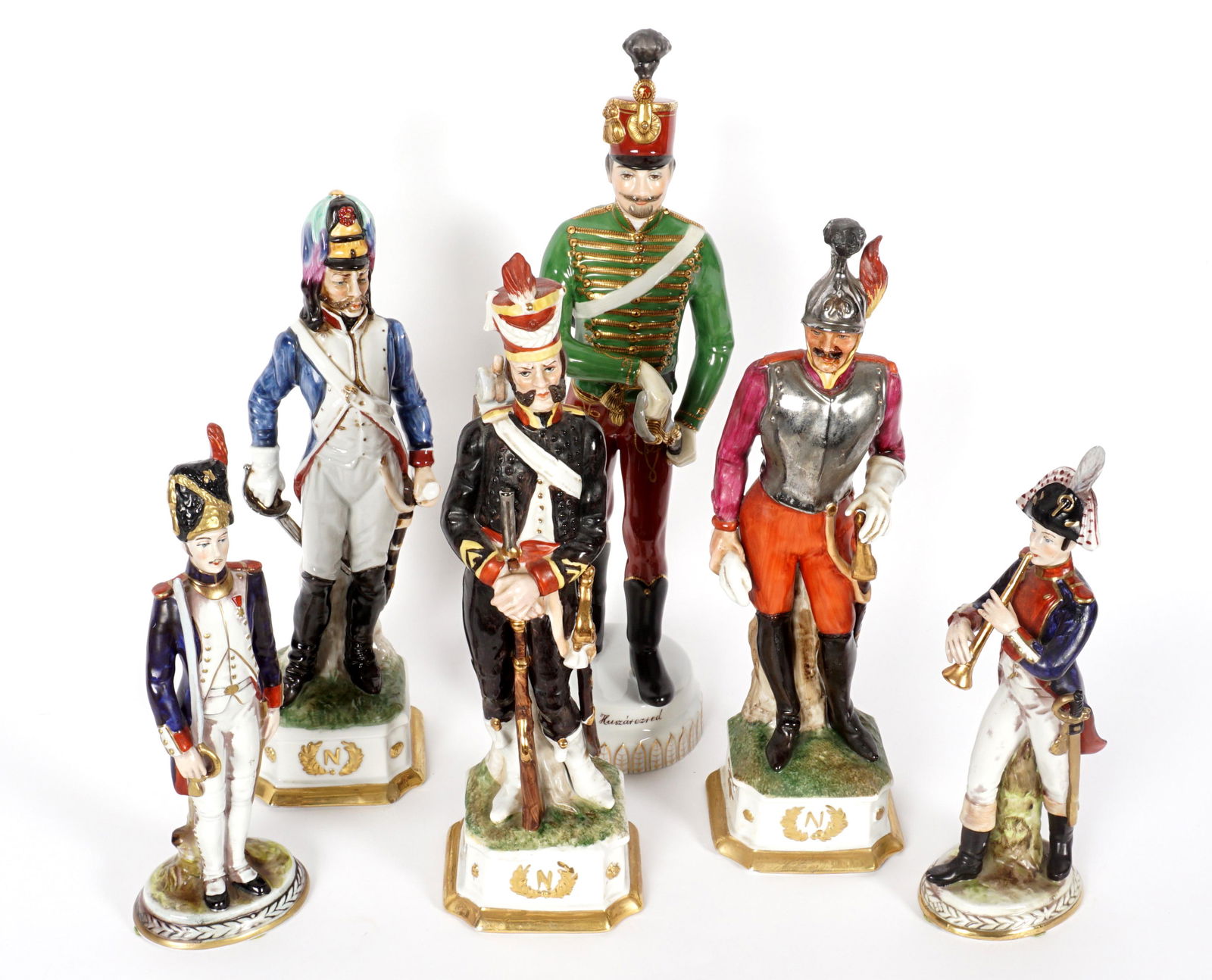 Six Assorted Porcelain Soldier Figurines: An assembled collection of six pieces total to include 1-3) Di Pietro figures of three soldiers, each marked separately 1258,1259,1260. 4) Soldier with sword, impressed 656. 5) Soldier musician, blue