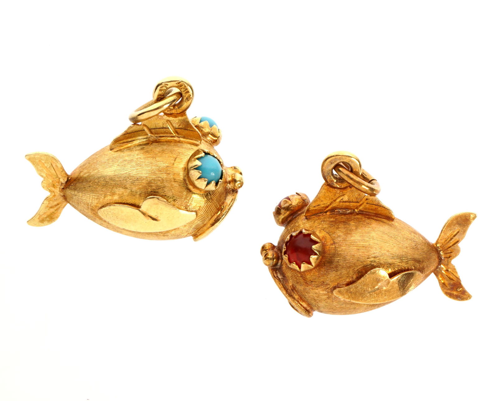 Pair of 14k Gold Goldfish Charms: One with turquoise eyes, the other with red eyes, stamped 14k Italy, approx. .75" long. Approx. 7 grams inclusive.