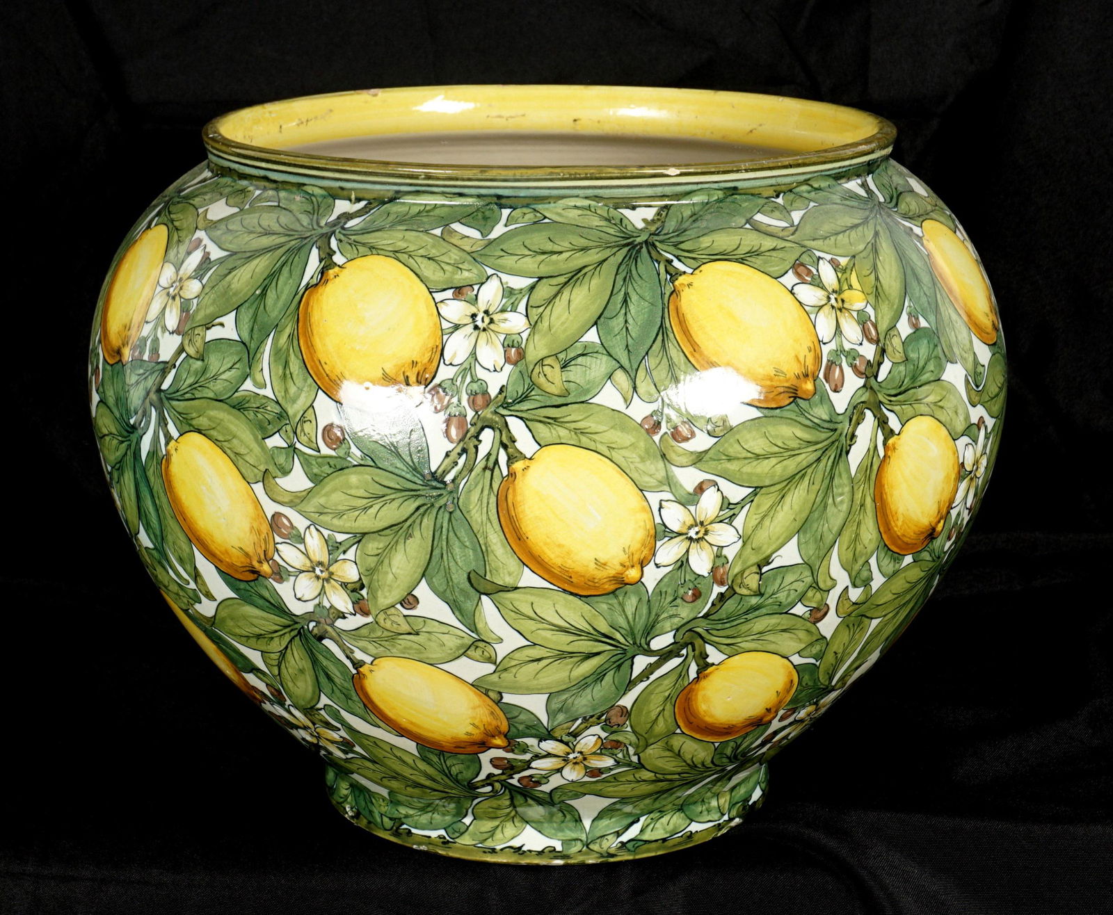 Large Italian Cantagalli Majolica Lemon Jardiniere: Large majolica jardineire, decorated with lemon branches and fruit motif, stylized rooster and impressed "2" on base, overall 12.5" h .x 16.5". Condition: Rim chips and glaze flaws.