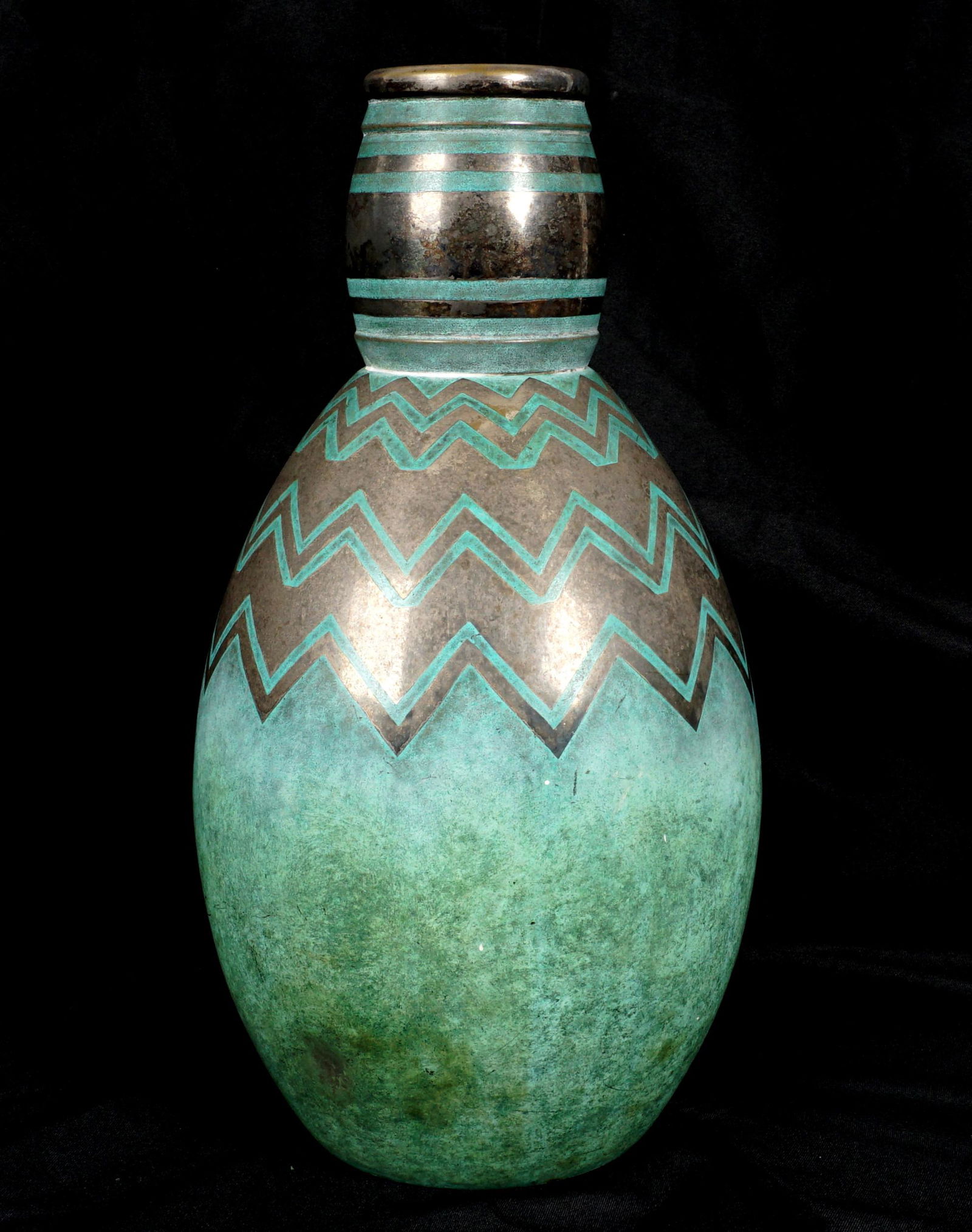 1930's Luc Lanel Christofle Dinanderie Vase: Ovoid form body with extended bulbous neck, verdigris and brass geometric designs, silverplate rim, marked on base Christofle, B 260 E, overall 16.5" x 8.5". Condition: Approx. 1.5" dia. ding near bas