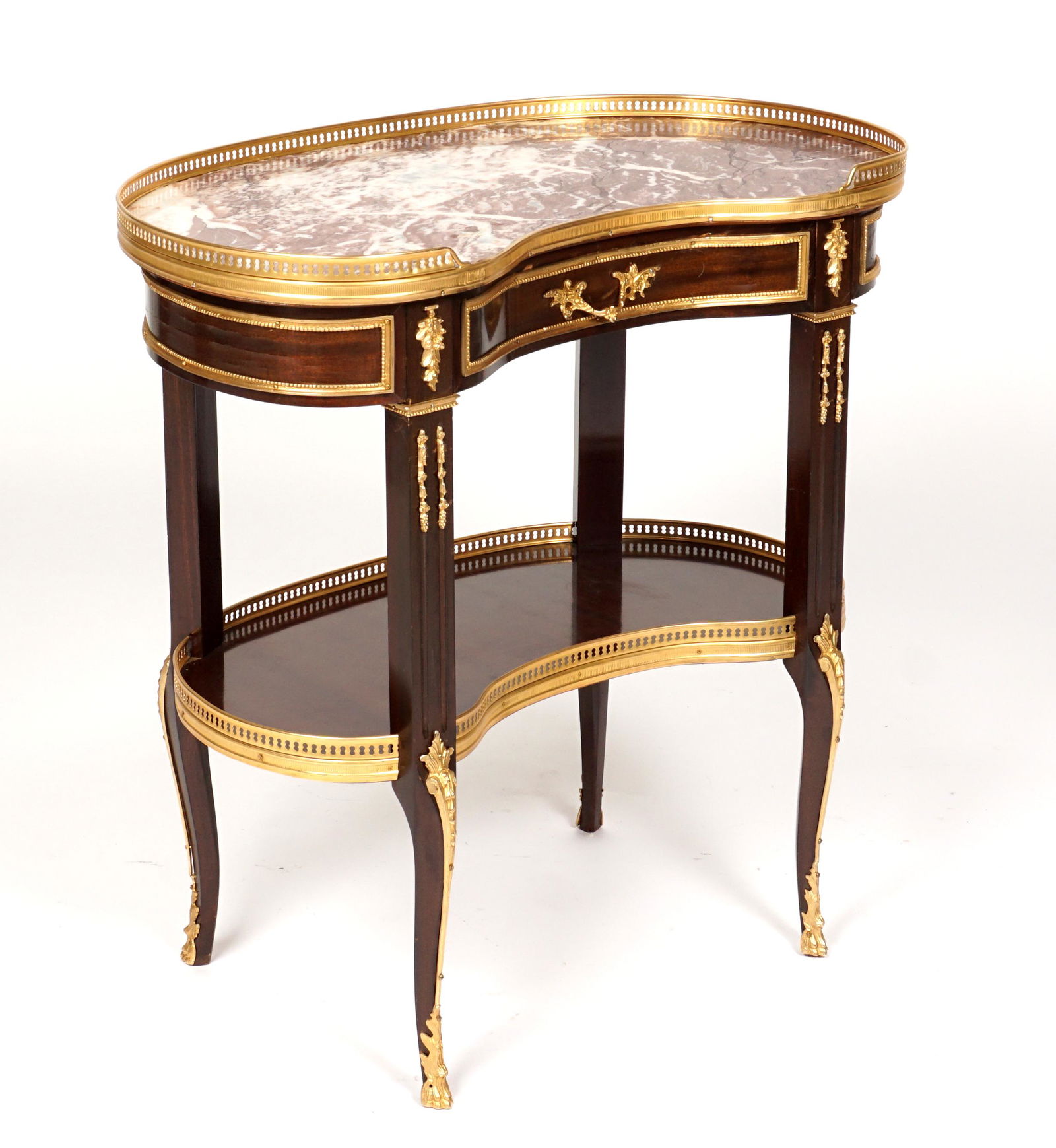 French Kidney Marble Top Ladies Writing Desk: Pierced brass gallery over kidney shaped rouge marble top. Rosewood base, center drawer, ormolu mounts and decoration, conforming lower stretcher shelf, paw feet. Overall 30.25" h. x 29.5" x 16.5".