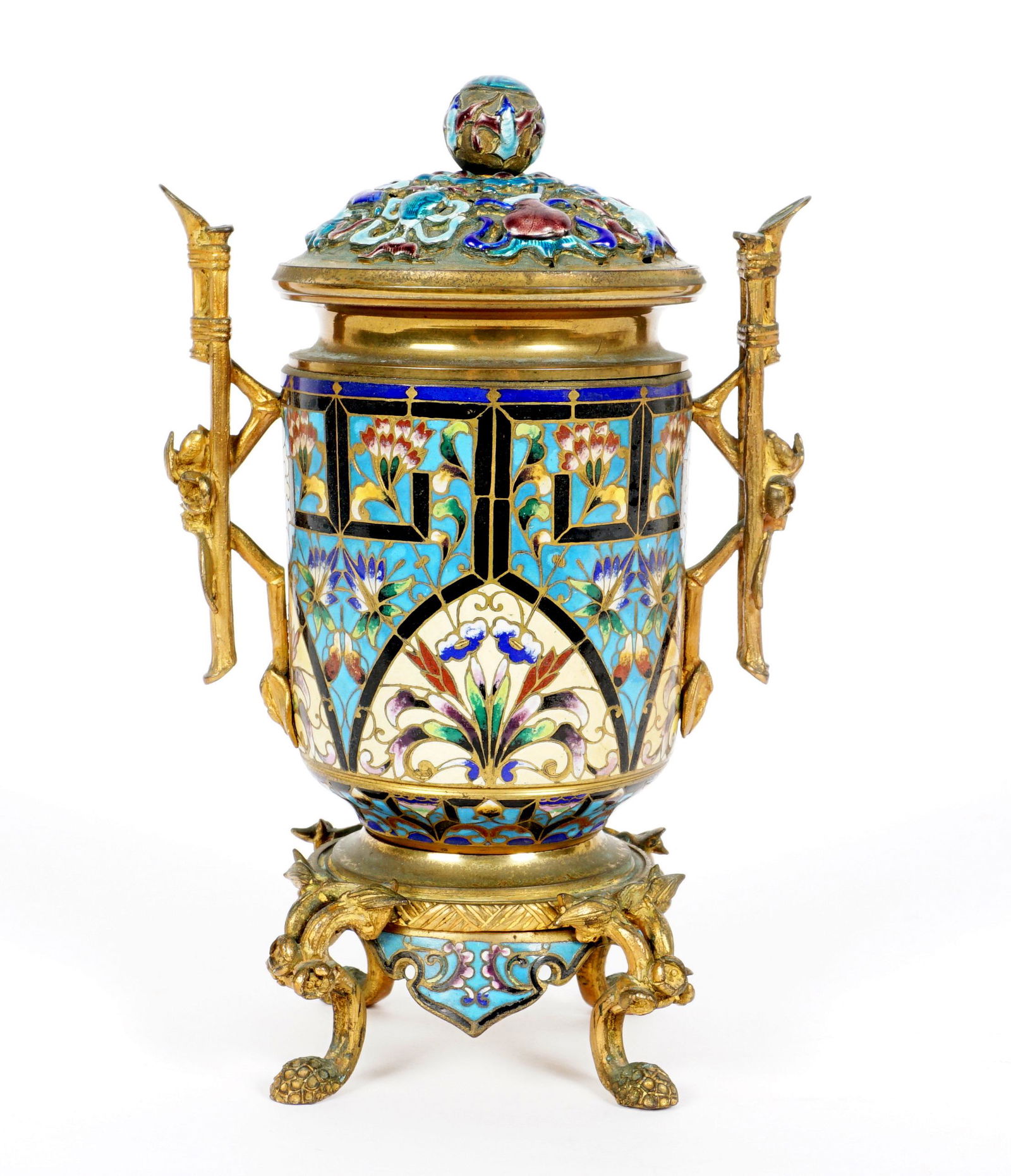 Chinese Cloisonne and Gilt Metal Covered Urn: Gilt metal covered urn, floral cloisonne and applied enamel decoration, bamboo form handles, all on four feet. 8.75" h. x 5.75". Condition: Wear to gilt.