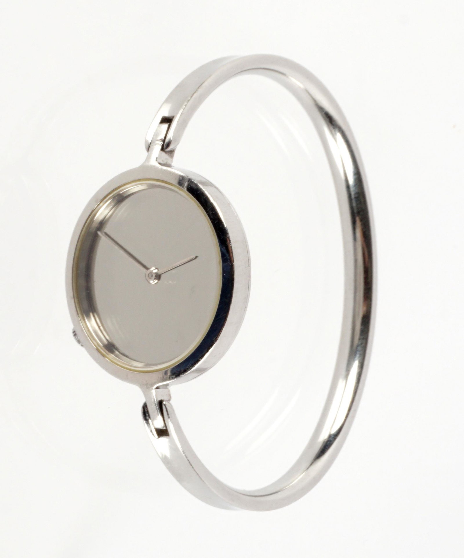 Georg Jensen Torun 337 Stainless Steel Watch: Stainless steel band, mirror face with no markings, marked on case "Georg Jensen Denmark Stainless, 337 Design Torun". 2" internal width x 1.5" internal height. Sold with original box. Minor scratches