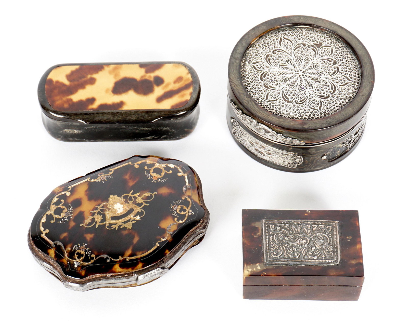 Four Antique Tortoise Shell Objets de Vertu: An assembled collection of four pieces total to include 1) Serpentine coin purse inlaid silver and gold toned metal, 3" x 2.5". 2) Small rectangular snuff box, silvered plaque on top, .75" h. x 2" x 1