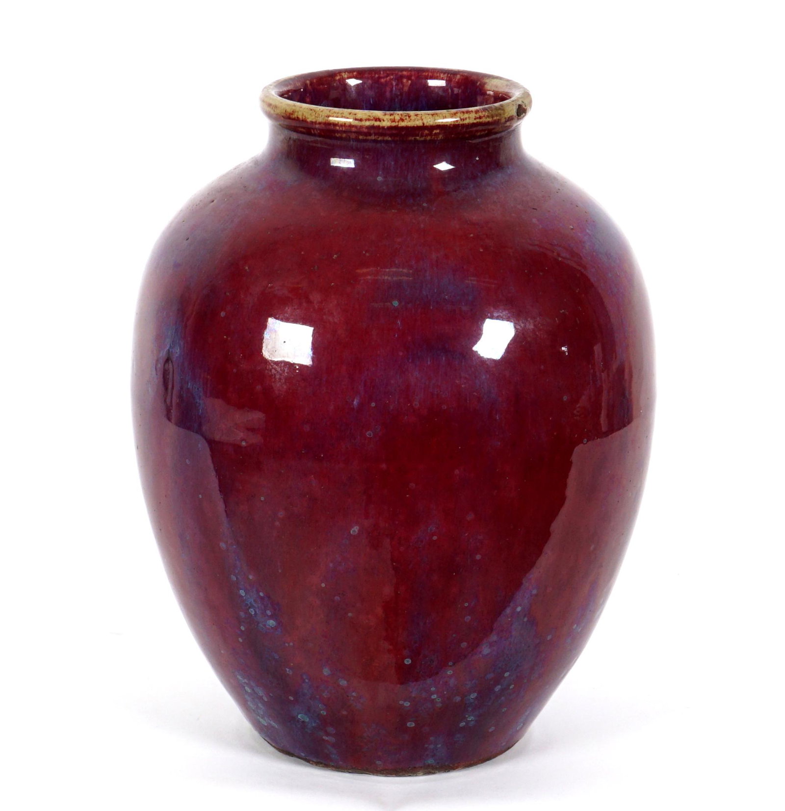 19th Century Chinese Sang de Boeuf Vase: Ovoid form body, ox blood and blue hues glaze, unmarked, overall 13.25" h. x 9.5". Condition: Chip to rim.