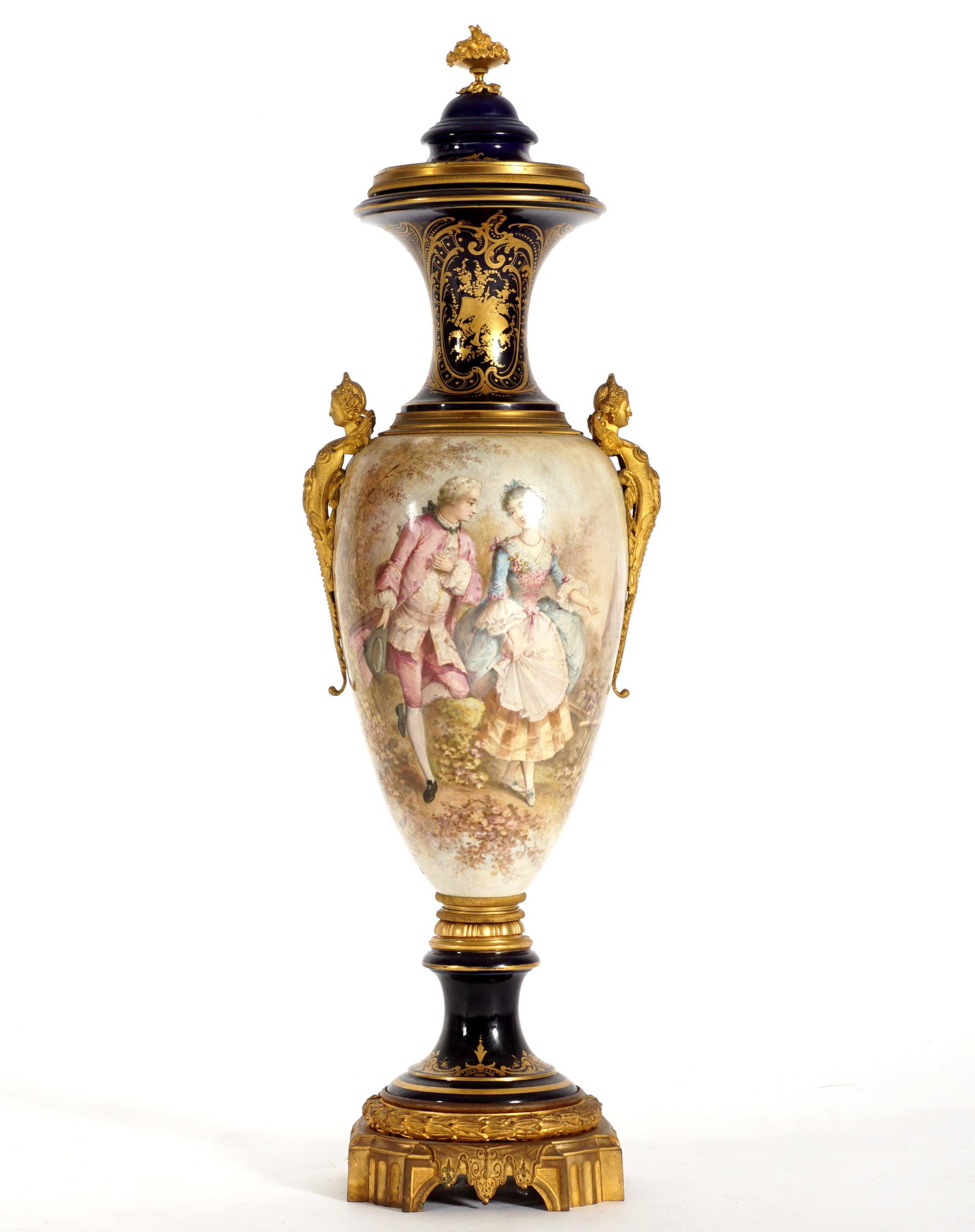 Sevres Style Bronze Mounted Floor Vase: Baluster form vase, cobalt ground gilt decorated rim, neck, and base. Body with hand painted lovers genre scene, landscape verso. Applied gilt bronze caryatid handles, gilt bronze base, no visible mar