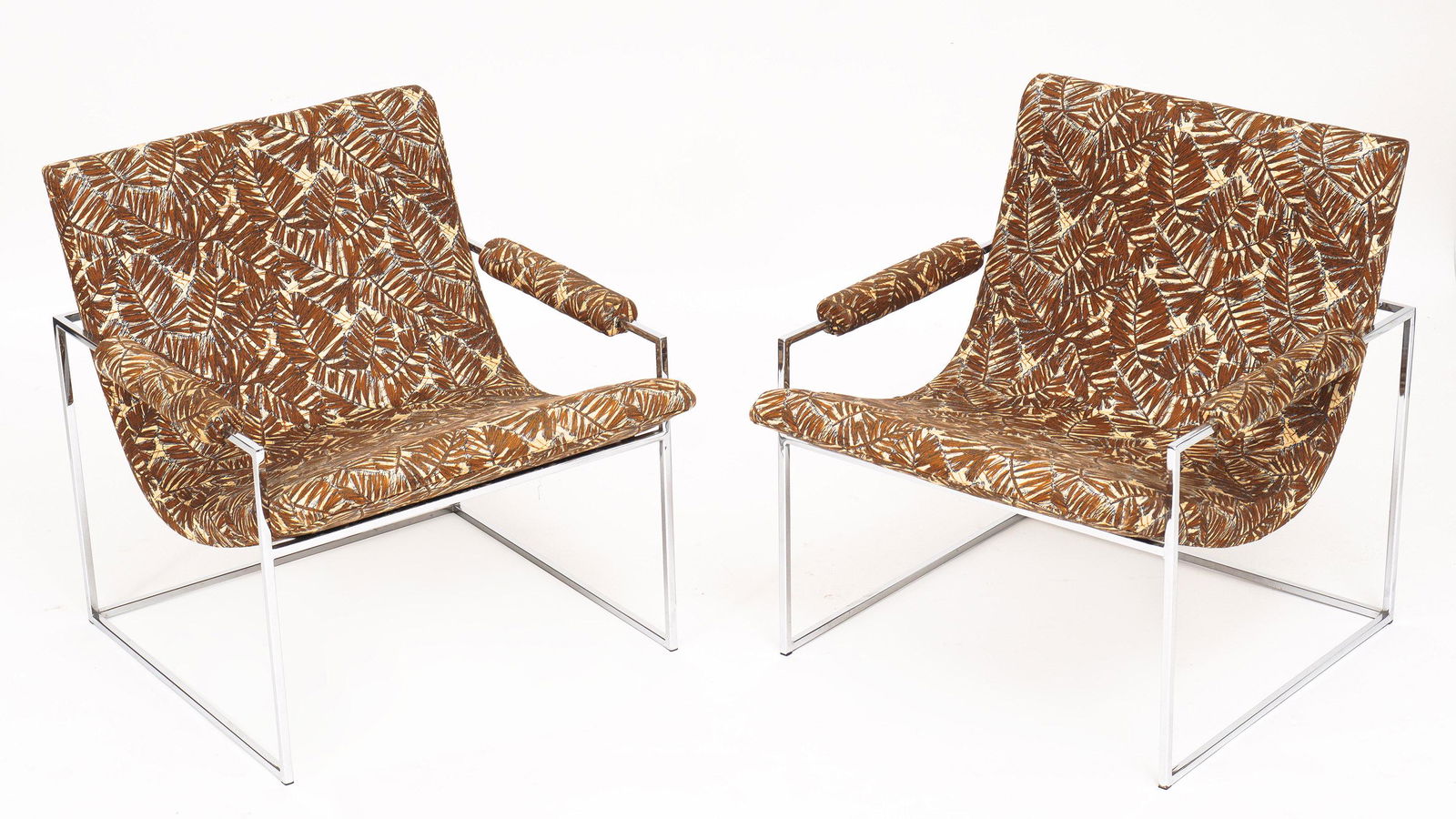 Pair Milo Baughman for Thayer Coggin Lounge Chairs: Chrome steel tube frames, brown fern pattern upholstery, manufactures tag under seat. Overall