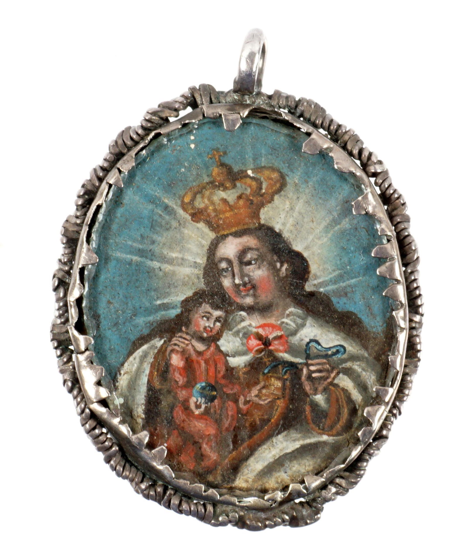 Spanish Colonial Double Sided Reliquary Pendant: 18th Century, polychrome hand painted depiction of Mary and baby Jesus one side, Joseph and baby Jesus other side, silver frame with rope twist border, overall 2.5" x 1.75". Condition: Dings to frame.