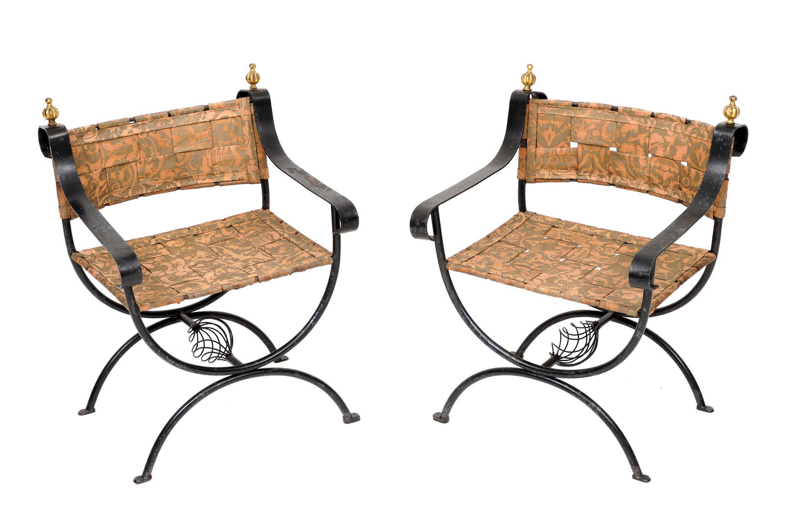 Pair Italian Style Wrought Iron Arm Chairs: Shaped back, gilt metal globe finials, scroll arms, bent tube "X" form legs, center stretcher with open swirl design, lattice web upholstered seats and back. Overall 33.5" h. x 24.75" x 23.5". Conditi