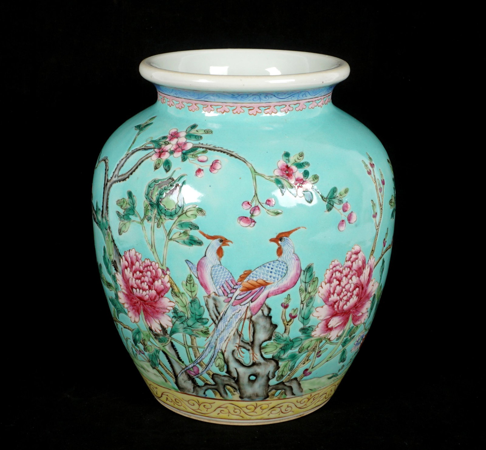 Chinese Famille Verte Vase: Ovoid form porcelain vase, turquoise / green ground with incised flowering branches with birds of paradise motif, overall 9.5 h. x 8" dia. Condition: Drilled base.
