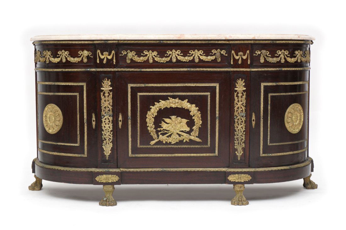 French Marble Top Credenza: 20th Century, mahogany case with applied gilt metal decoration and hardware, single center drawer over single door flanked on either side by drawer over door, overall 38.5" h. x 69.5" x 20.75".