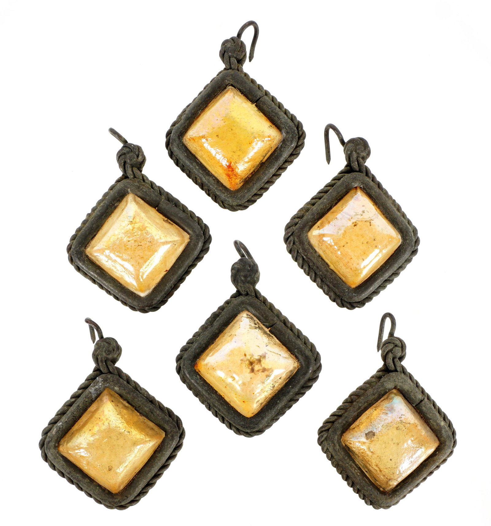 6 Tiffany Favrile Glass & Bronze Lamp Teardrops: A lot of 6 Tiffany Favrile glass and bronze teardrops from lamp. Each measures approximately 0.5 inches deep by 1.12 inches across (not including corner hook.) Condition: Various signs of age and wear