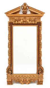 William Kent Style Mahogany & Giltwood Mirror: Wall mirror in the style of William Kent, architectural crest, center medallion and foliate scroll medallion. Beveled glass mirror bordered in mahogany veneer, foliate gilt wood outer frame. Lower cre