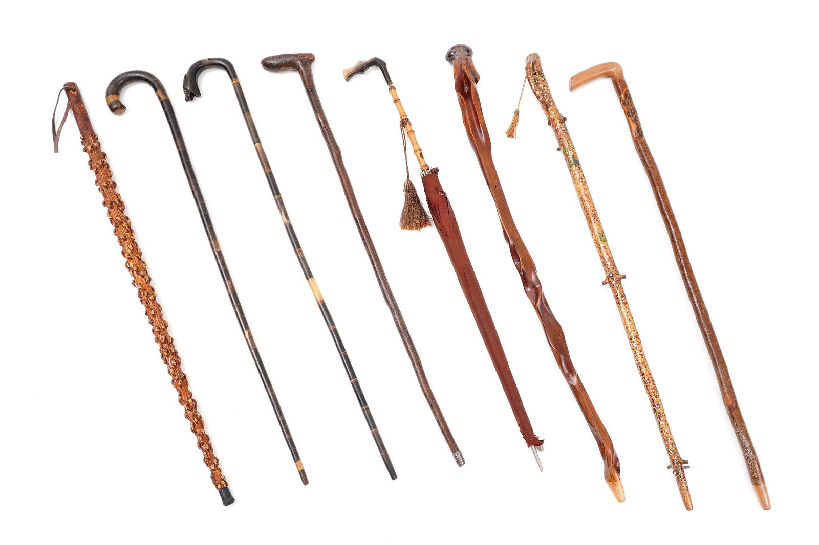 Collection of 7 Canes and a Parasol (1 of 5)