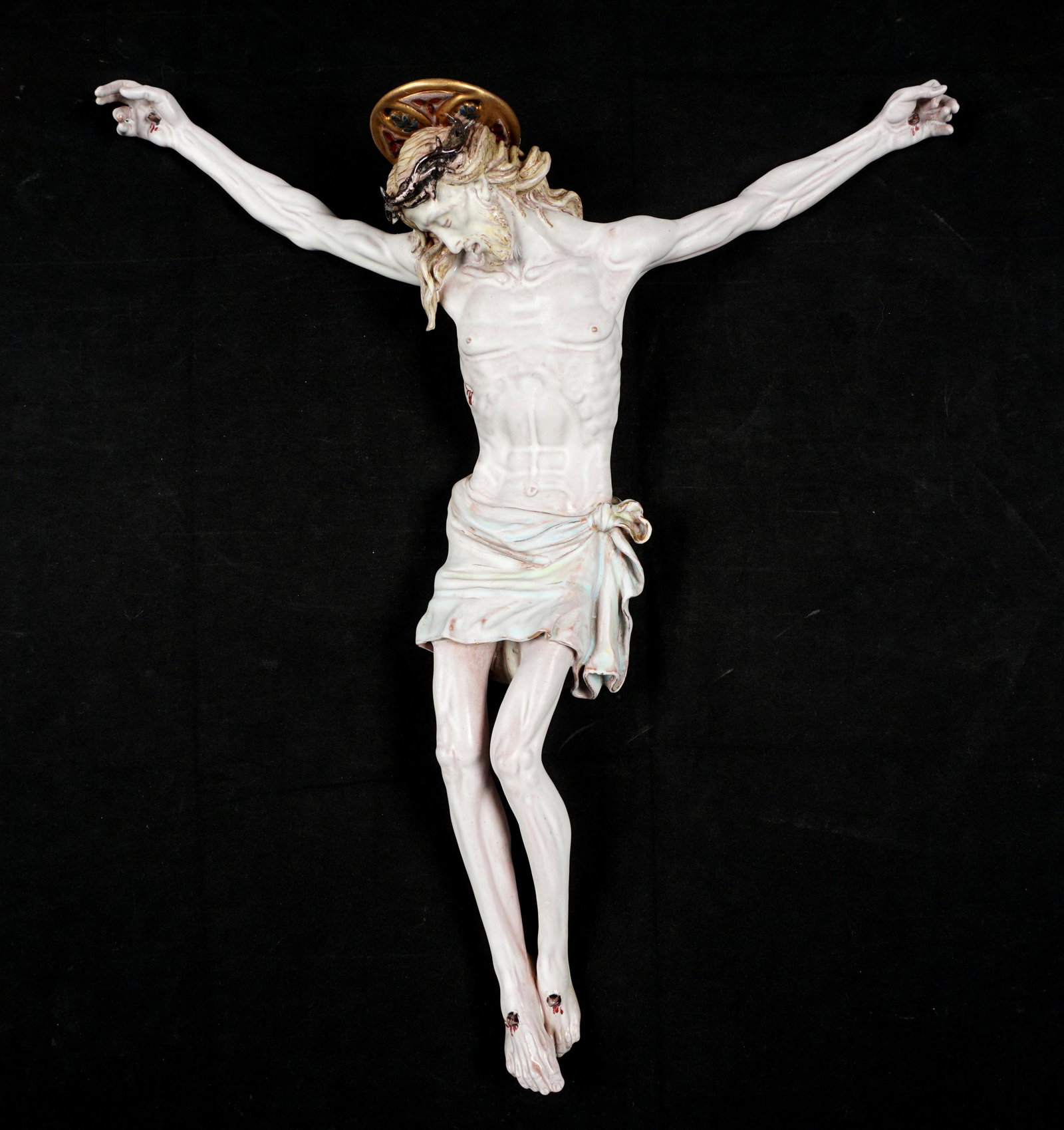 Eugenio Pattarino Crucified Jesus Wall Icon Plaque: Polychrome decorated terracotta figure of crucified Jesus, signed on back Prof. E. Pattarino, Italy, L68. 16.5" x 13.75" x 3". From the estate of a prominent lawyer from New Rochelle, NY.