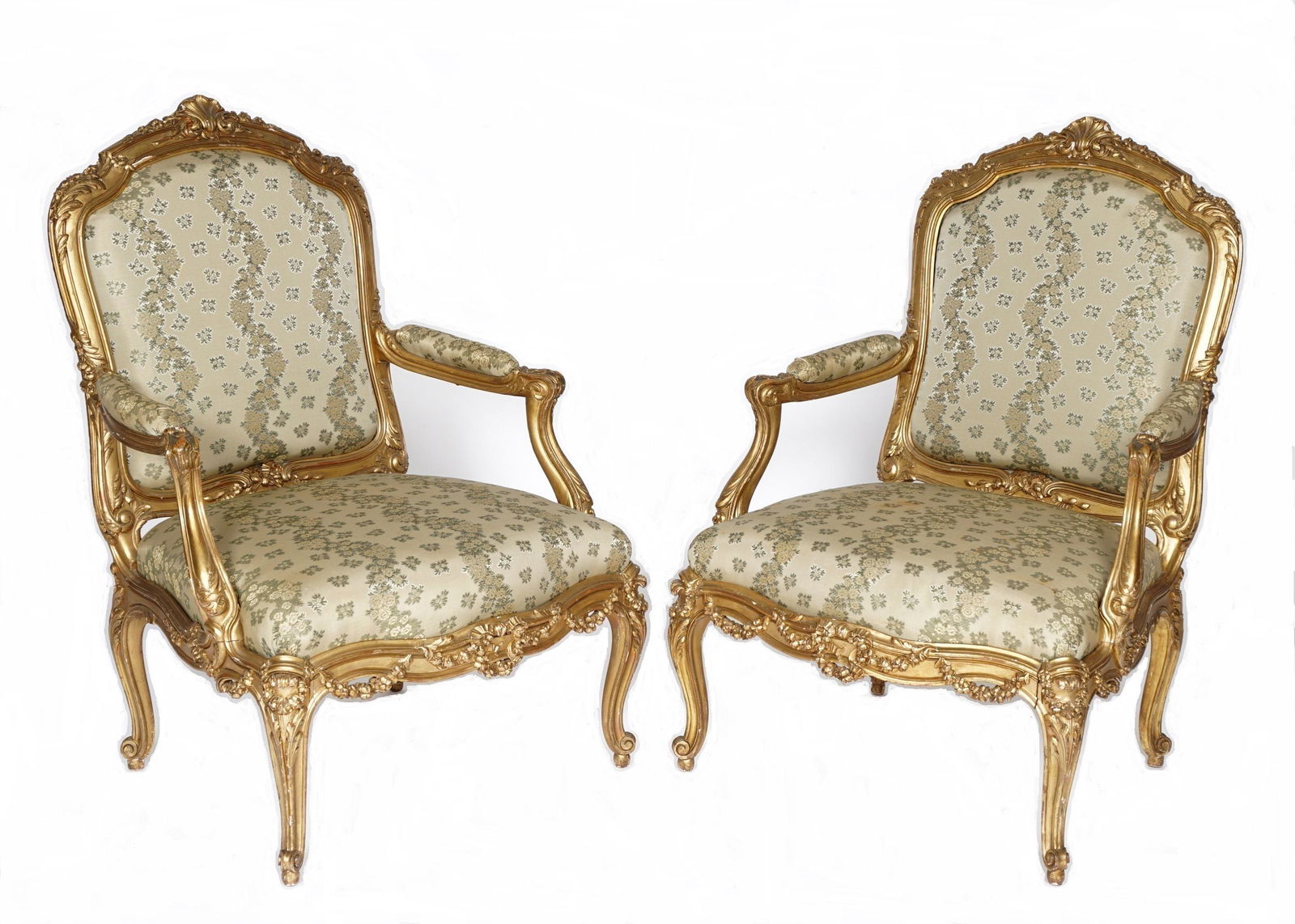 Pr 19th C French Carved Gilt Wood Fauteuil Chairs: Carved and shaped gilt wood frames, center shell crest top rail, shaped open arms and skirt, carved foliate scroll and floral garland motifs, cabriole legs ending in scroll feet. Green / grey foliate
