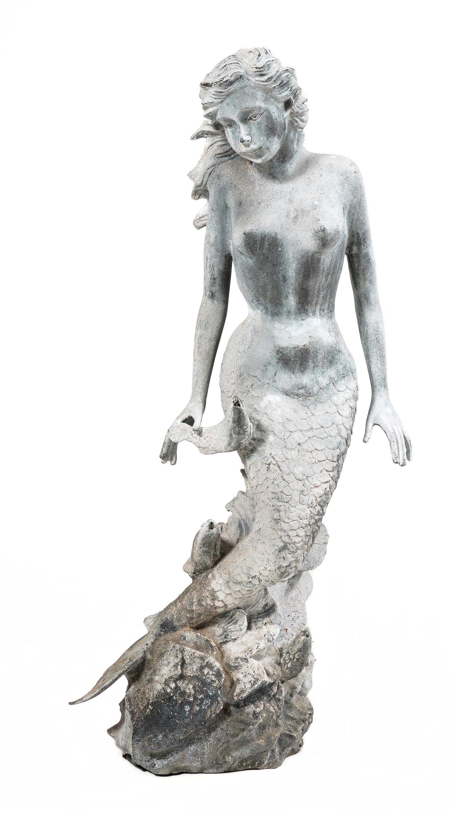 Bronze Mermaid with Fish Garden Fountain: Figure of a mermaid with three fish spouts, unsigned, overall 41.5" h. x 21". Condition: Obvious signs of weathering, no pump.
