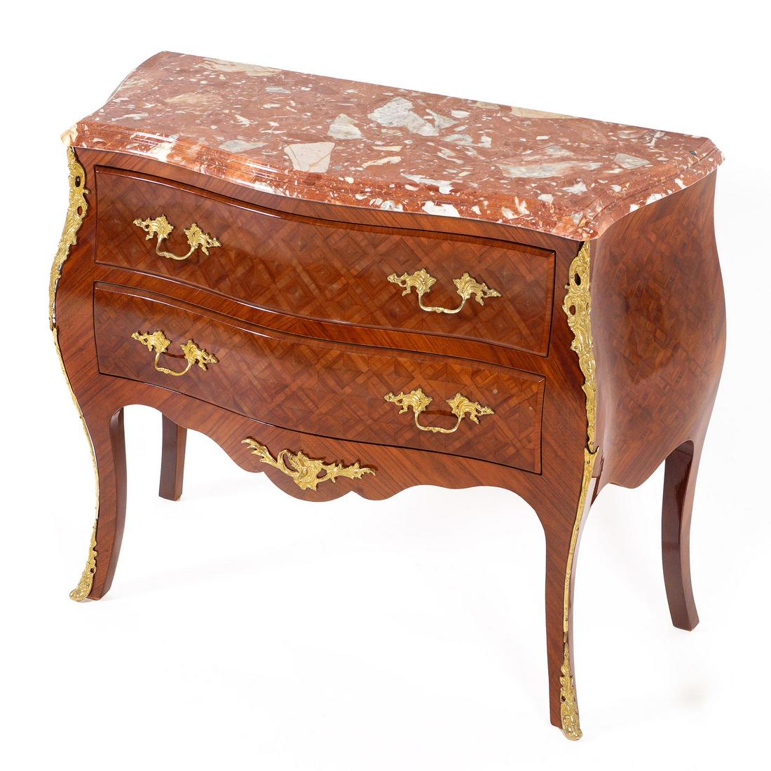 French Louis XV Style Marble Top Commode: Diminutive commode, serpentine marble top over conforming parquetry inlaid two drawer case, applied gilt metal mounts and decoration. Shaped legs ending in gilt metal feet, overall 31" h. x 38.25" x 1