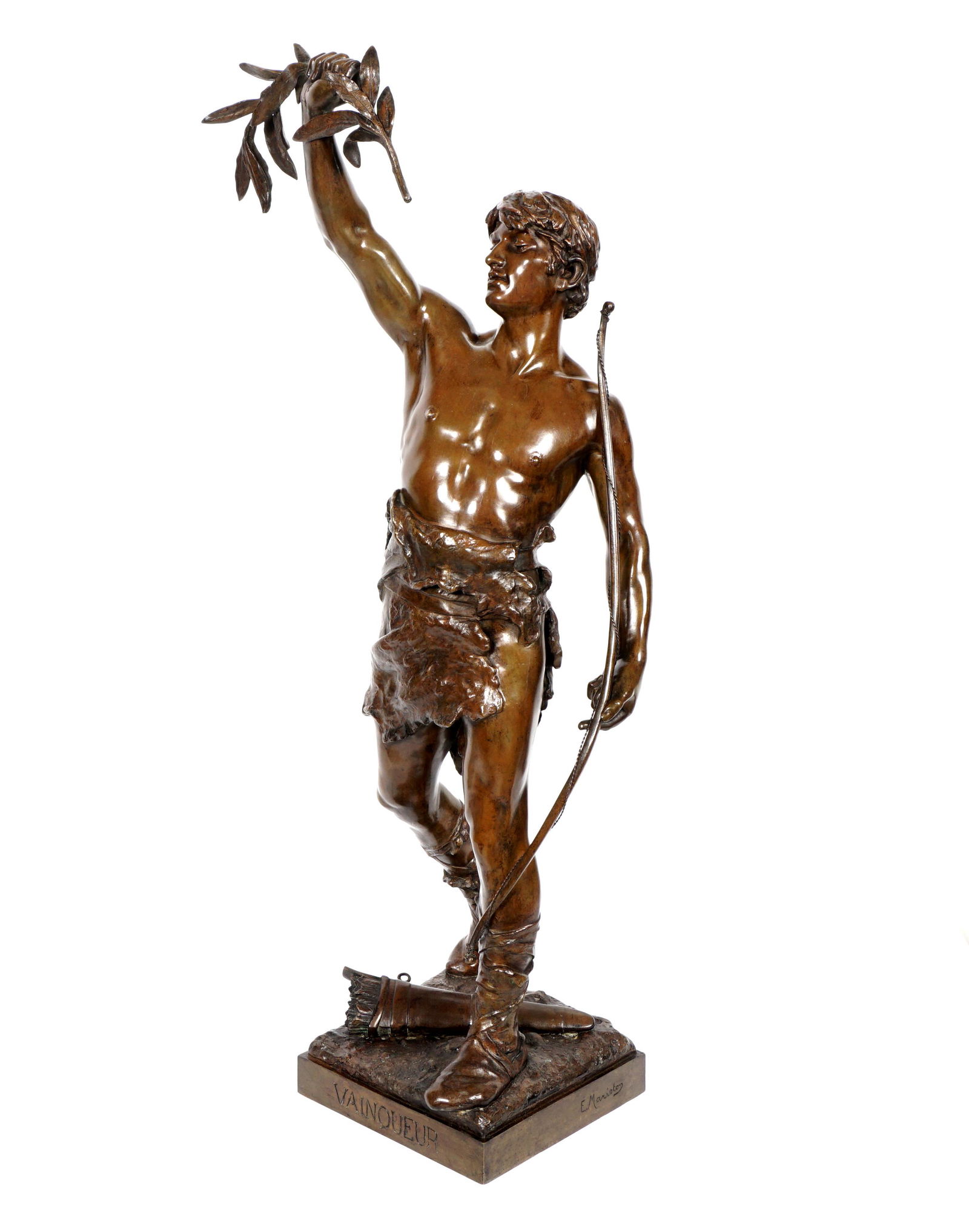 after Eugene Marioton Vainqueur Bronze Sculpture: after MARIOTON, Eugene, (French, 1854-1933): Figure of a man clad in animal skins, holding a bow in one hand, branch in the other, signed and titled on base, overall 37.25" h. x 13.5" x 13". From the